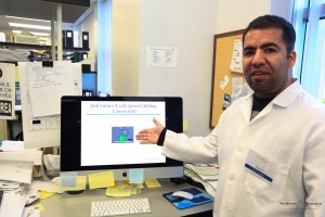 Sanford-Burnham post-doctoral researcher emplaning how anti-tumor-T cell kills cancer cell